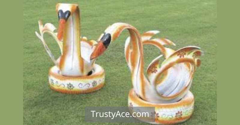 Colored Swan Tire Planters Ideas