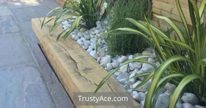 Landscape Border Ideas Using Vertical Railway Sleepers