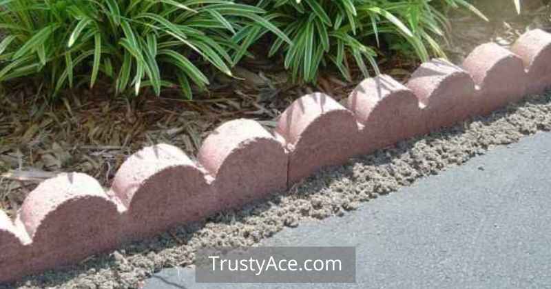 Landscape Border Ideas With Scalloped Stone Border