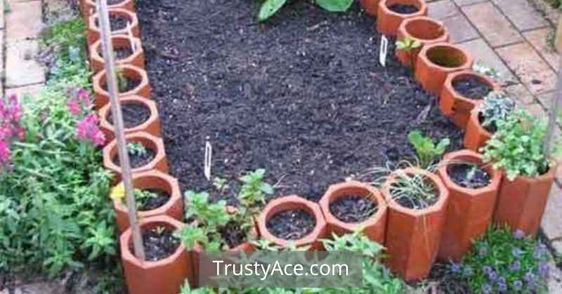 Landscape Border Ideas With Terracotta Pipes Edging