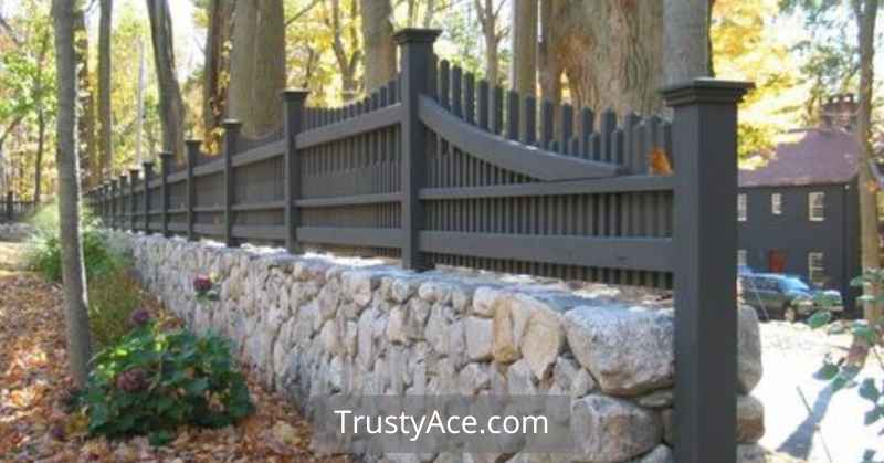 Stone Wall With Fence On Top