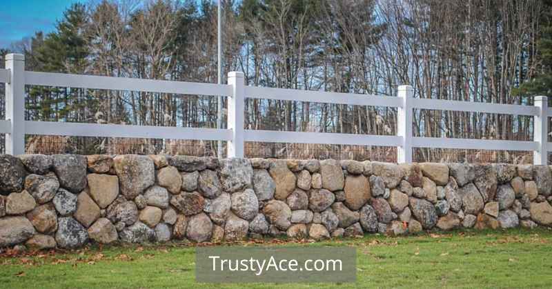 Fence On Top Of Stone Wall